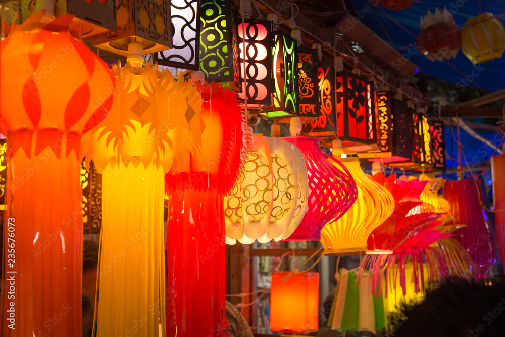 A streetside shop selling traditional lanterns before Diwali festival in India.