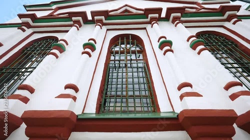 Windows with bars on Russian Church in Valishevo Moscow region photo