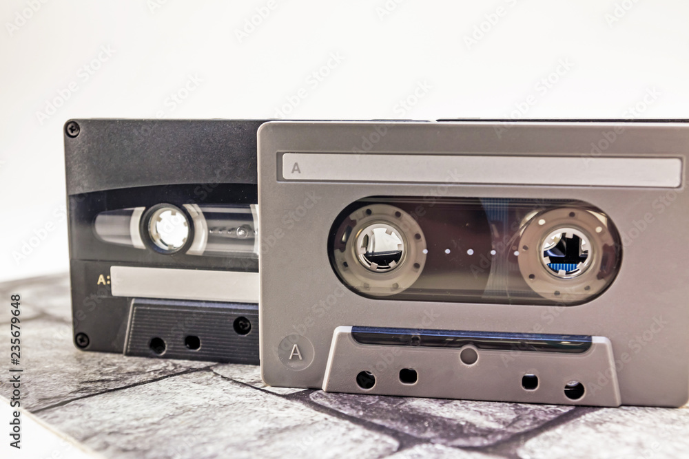 Audio cassettes on different background