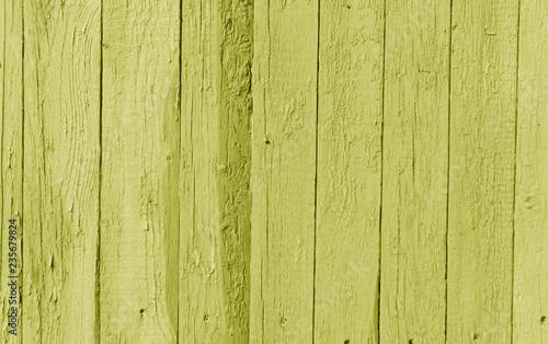 Old wooden wall in yellow color.