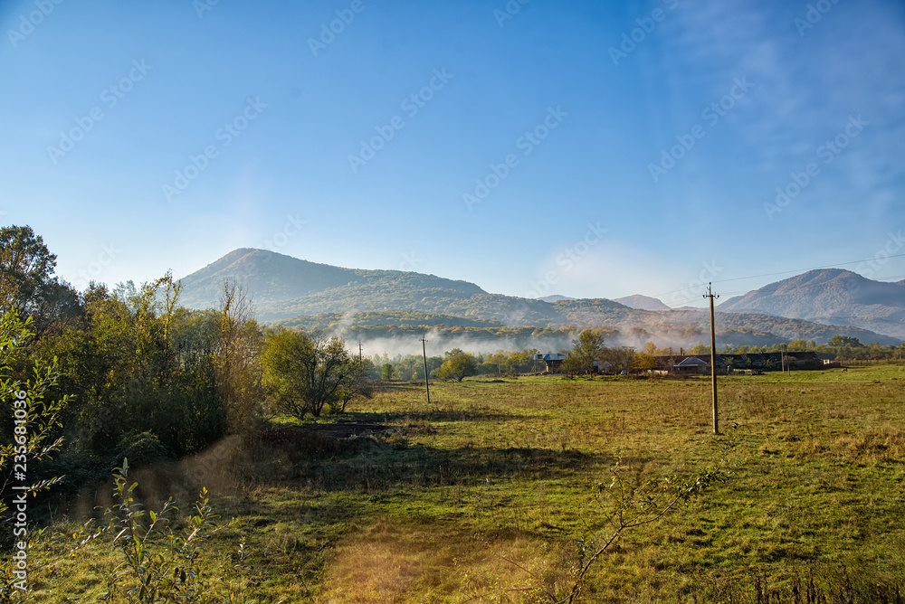 Obraz premium Beautiful mountain landscape with rocks and fog