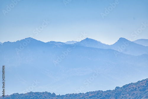Beautiful mountain landscape with rocks and fog © greentellect