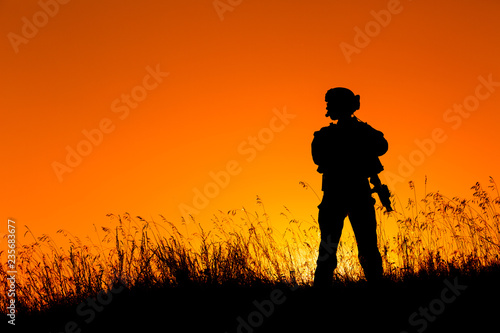 military soldier with weapons © kaninstudio