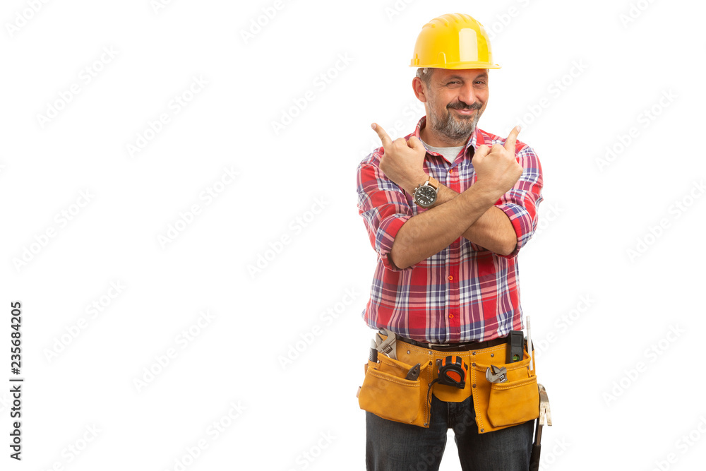 Builder holding arms crossed with middle fingers up. Builder holding arms crossed with middle fingers up.