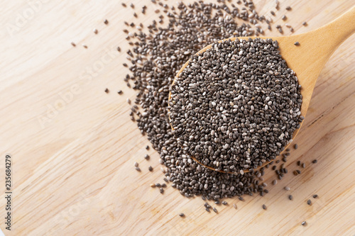 Close up of Chia seeds on wooden spoon