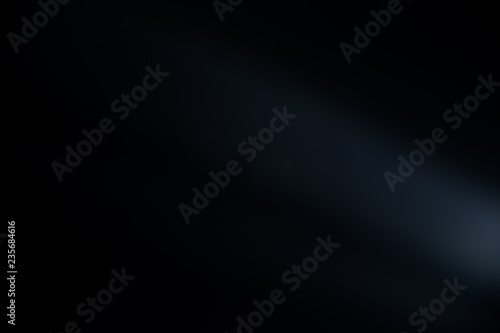 black spotlight shiny bokeh background. 