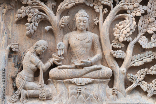 Stone statue of buddha at Mahabodhi Temple Complex in Bodh Gaya, India