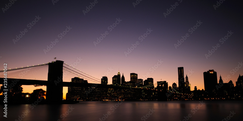 new york city skyline at sunset brooklyn bridge