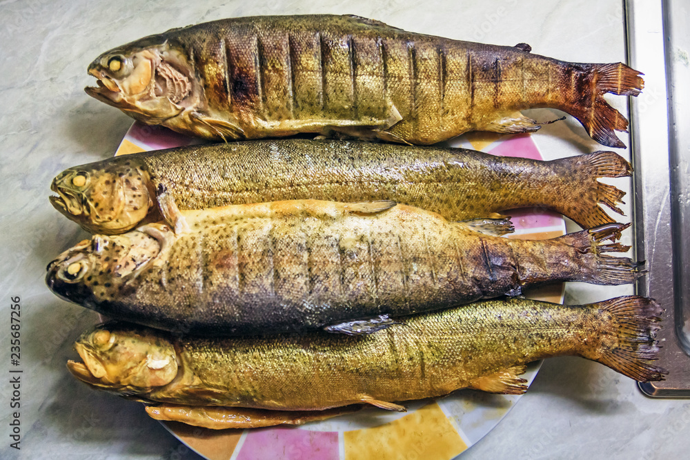 Fototapeta premium grilled trouts on the plate