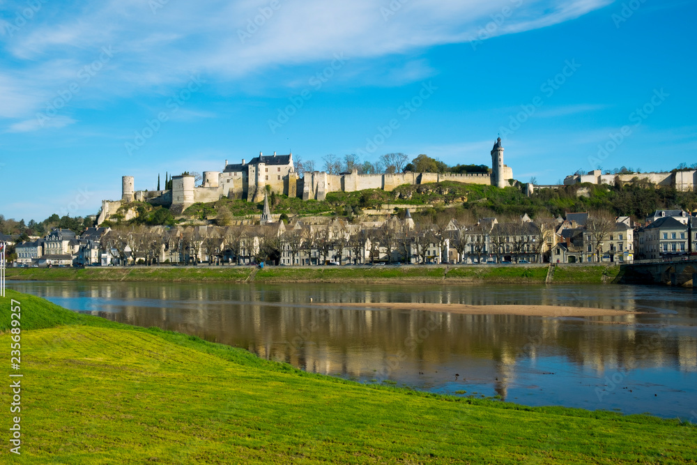Beautiful spring morning sunshine in Chinon town and chateau on the hill above by the banks of the Vienne River, Indre-et-Loire, France