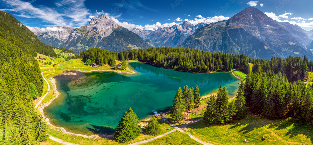 Fototapeta premium Arnisee with Swiss Alps. Arnisee is a reservoir in the Canton of Uri, Switzerland, Europe