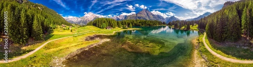 Fototapeta Naklejka Na Ścianę i Meble -  Arnisee with Swiss Alps. Arnisee is a reservoir in the Canton of Uri, Switzerland, Europe