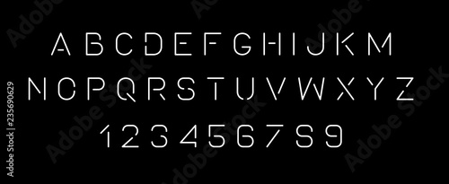 White of stylized modern font and alphabet. Isolated on Black background