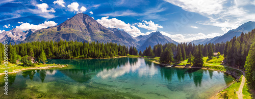 Fototapeta Naklejka Na Ścianę i Meble -  Arnisee with Swiss Alps. Arnisee is a reservoir in the Canton of Uri, Switzerland, Europe