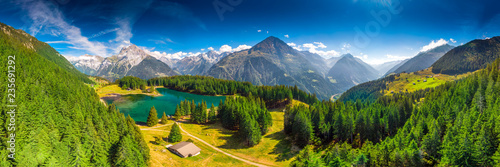 Tableau sur toile Areal view of Arnisee with Swiss Alps