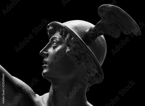 Ancient statue of the antique god of commerce, merchants and travelers Hermes - Mercury . He is alsow olympic gods messenger with wings on a helmet