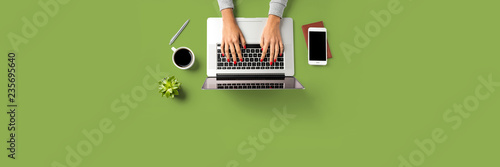 Woman working in modern office. Top view
