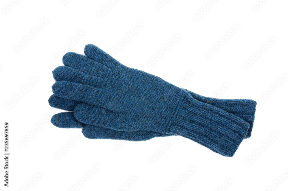 Knitted blue gloves handmade. Isolated on white background. View from above. Knitted blue gloves handmade. Isolated on white background. View from above.