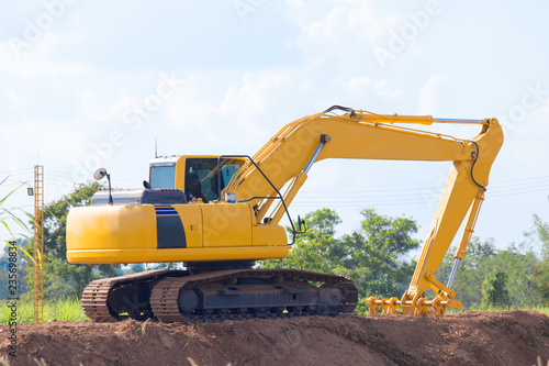 Yellow backhoe in the construction site, backhoe for construction.