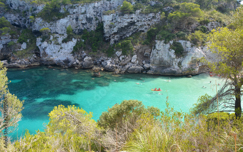 Turquoise water in bay Cala Macarelleta, Menorca island