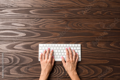 Woman using computer keyboard