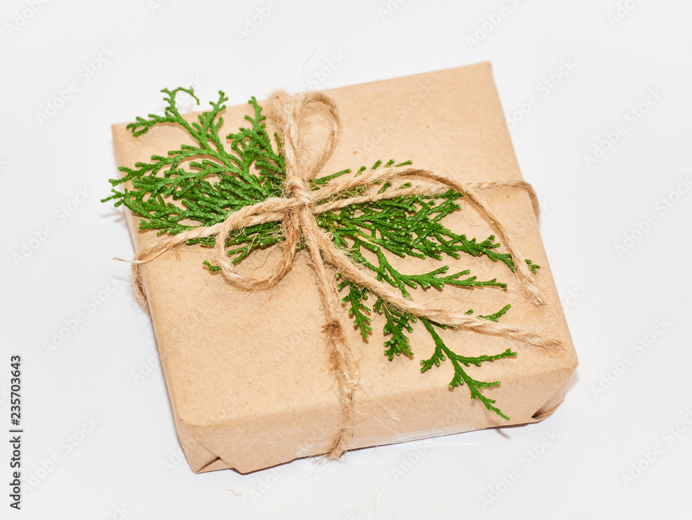 Christmas composition. Christmas gifts, pine branches, toys on white background. Flat lay, top view Christmas composition. Christmas gifts, pine branches, toys on white background. Flat lay, top view