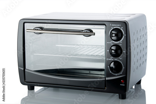 Cooking: Close up of Black Colored Oven Isolated on White Background