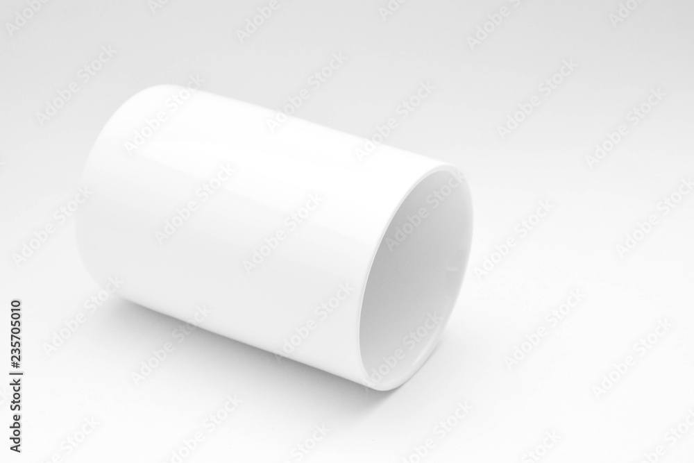 white ceramic cup of coffee with shadow white ceramic cup of coffee with shadow