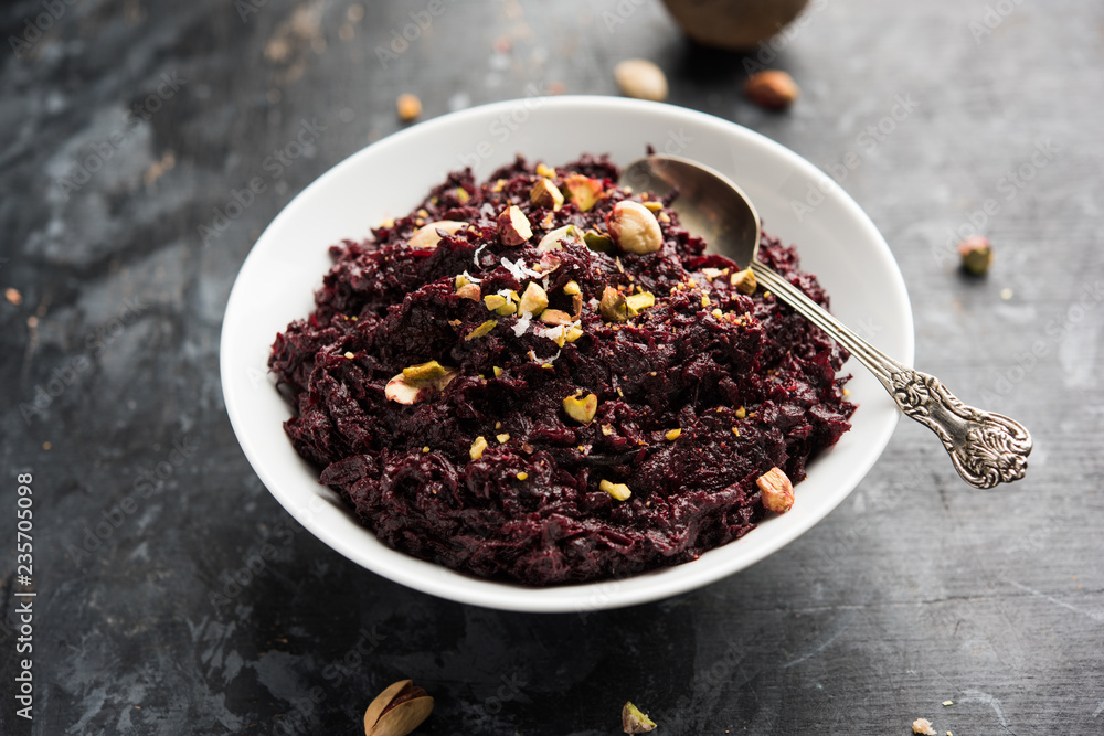 Beetroot Halwa garnished with Pistachio served in a bowl, selective focus Beetroot Halwa garnished with Pistachio served in a bowl, selective focus