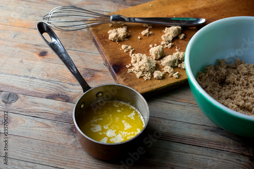 Close up of melted butter and breadcrumb mixture on table