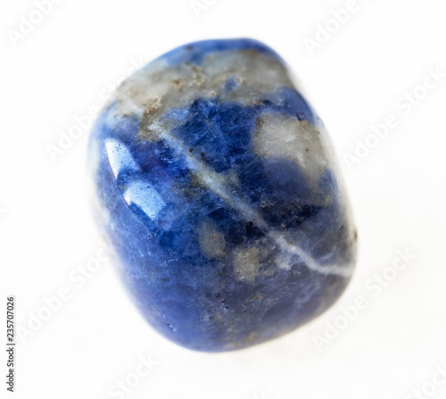 polished blue Sodalite stone on white