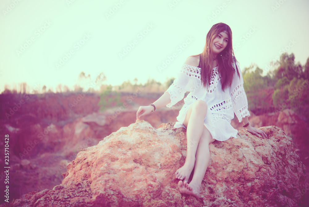 Portrait of bohemian woman on sunset,Lifestyle of modern thailand girl,Happy lady concept Portrait of bohemian woman on sunset,Lifestyle of modern thailand girl,Happy lady concept
