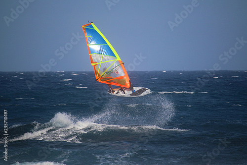 Windsurfer jumping in the waves of the Atlantic ocean
