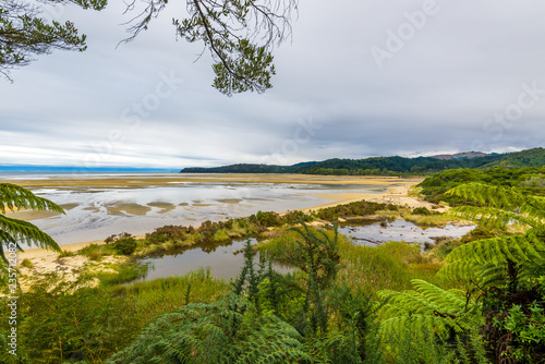 Desert tropical island beach, peaceful and calm landscape. Abel Tasman National Park, New Zealand