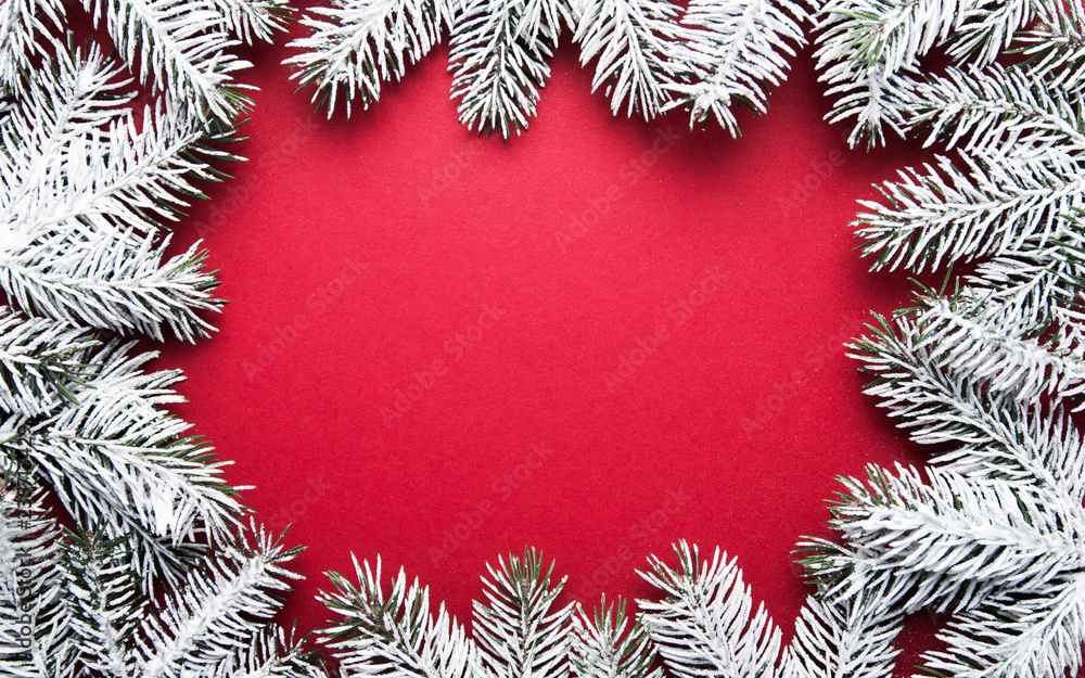 Merry Christmas and Happy Holidays greeting card, frame, banner. New Year. Noel. Silver, white and red Christmas ornaments and fir tree on red background top view. Winter holiday xmas theme. Flat lay. Merry Christmas and Happy Holidays greeting card, frame, banner. New Year. Noel. Silver, white and red Christmas ornaments and fir tree on red background top view. Winter holiday xmas theme. Flat lay.