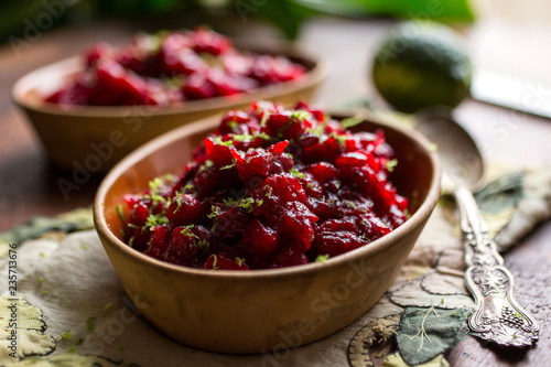 Close up of roasted chiltepin cranberry sauce with lime zest photo