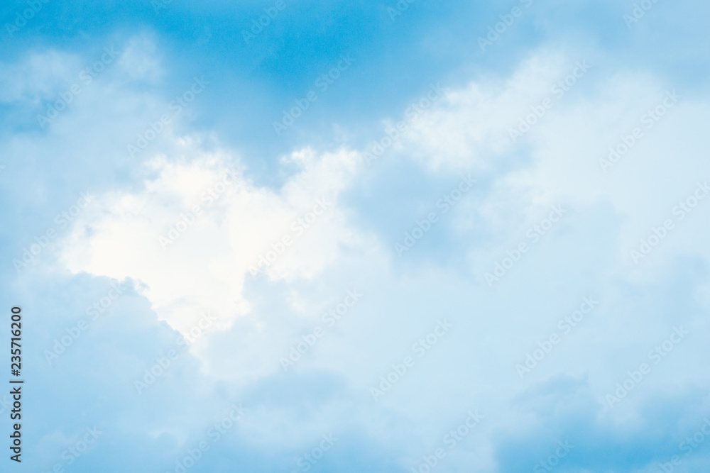 Obraz premium Sky-blue light fluffy clouds in sky with copy space. For background and wallpaper