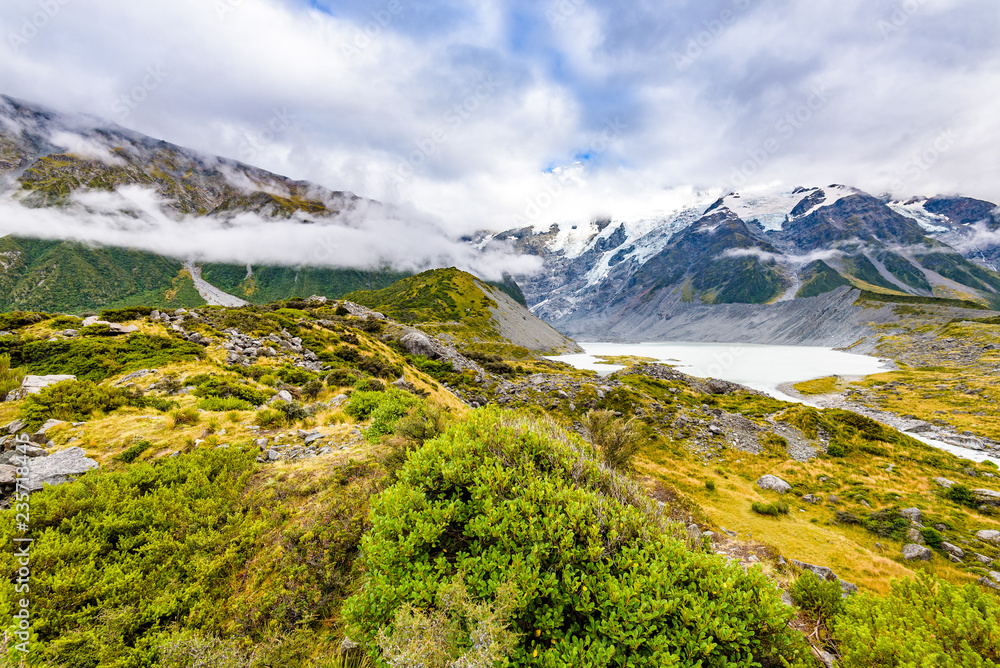 Amazing beautiful landscape at Hooker Valley Track, a breathtaking place in Aoraki, New Zealand. It is a famous tourist attraction surrounded by alpine mountain meltwater streams, glacier and lakes.