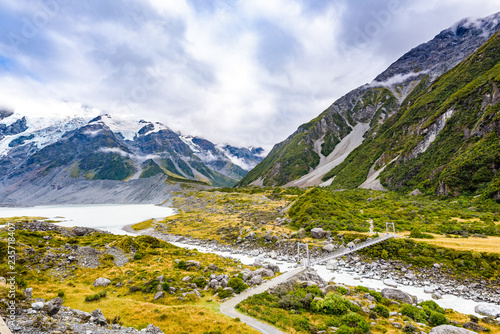 Amazing beautiful landscape at Hooker Valley Track  a breathtaking place in Aoraki  New Zealand. It is a famous tourist attraction surrounded by alpine mountain meltwater streams  glacier and lakes.