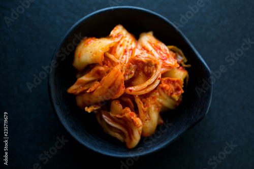 Close up of kimchi served in bowl photo
