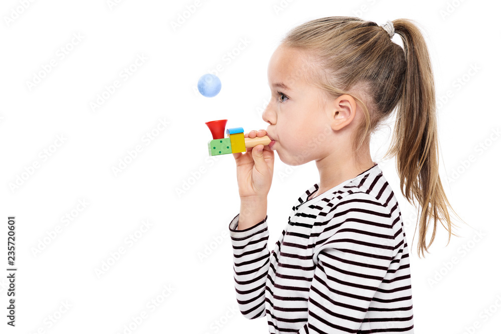 Cute young girl making special exercises at speech therapy office. Child speech therapy concept on white background. Speech impediment corrective exercises. Cute young girl making special exercises at speech therapy office. Child speech therapy concept on white background. Speech impediment corrective exercises.