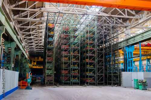 Warehouse with high racks  loaded with boxes  ready to be shipped to customers. 