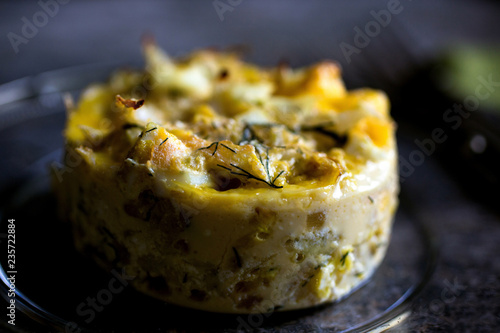 Close up of cabbage and ricotta timbale served on plate photo