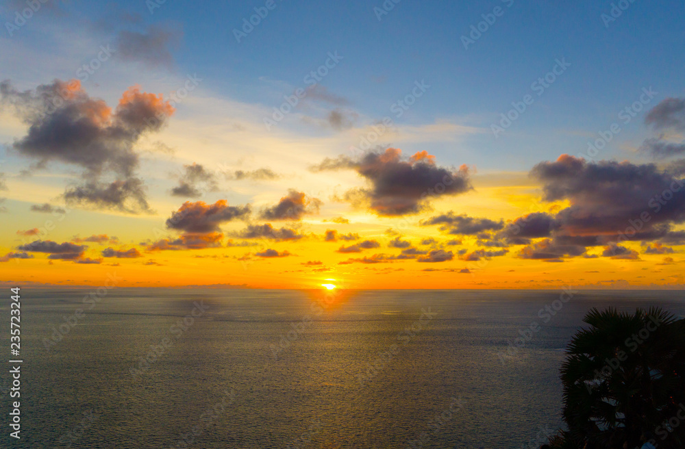 Beautiful sunset and cloud,paradise tropical island beach, sunrise shot,evening at Promthep Cape Phuket Thailand,silhouette landscape