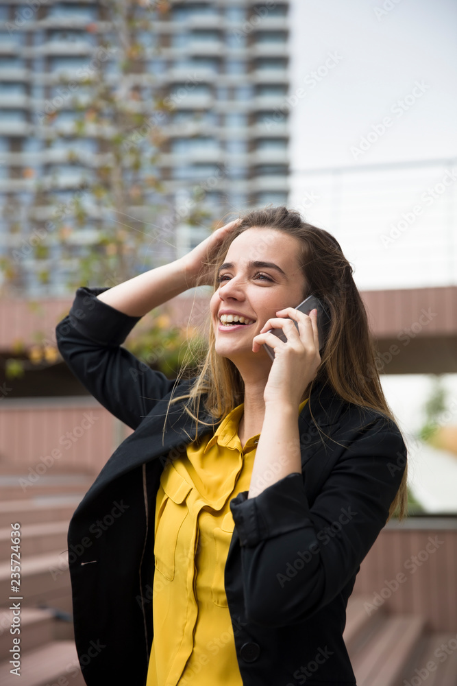Young businesswman using mobile phone outdoor Young businesswman using mobile phone outdoor