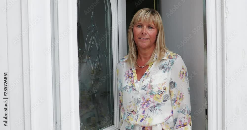 Portrait of Mature Adult Standing at the Door Portrait of Mature Adult Standing at the Door