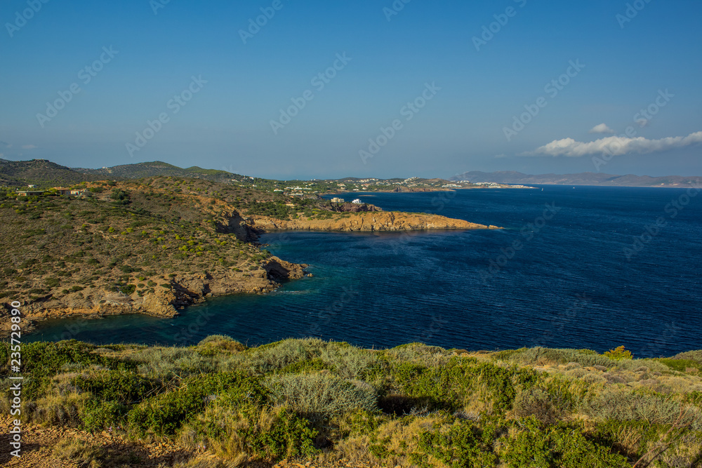beautiful summer nature scenery landscape of sea bay with shore mountain line and vivid blue sky
