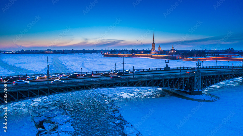 Saint Petersburg. Bridge over the Neva River. Trinity Bridge. Bridges of St. Petersburg. Russia. Petersburg in the winter. Peter-Pavel's Fortress. Ice on the river. Cities of Russia.