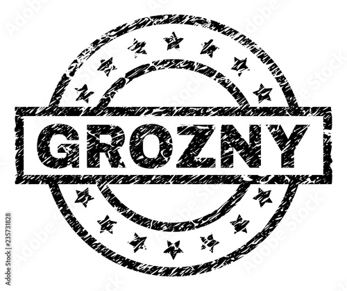 GROZNY stamp seal watermark with distress style. Designed with rectangle, circles and stars. Black vector rubber print of GROZNY label with retro texture.