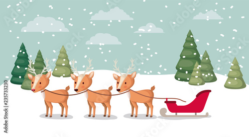 deer with sled in snowscape